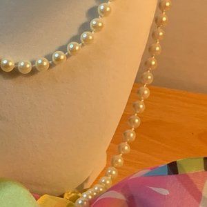Long women's faux pearls vintage 1970's 63' inches  long